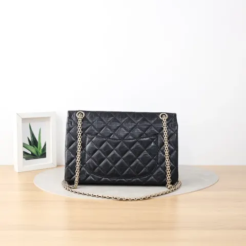 Bolsa de ombro larga Chanel 2.55